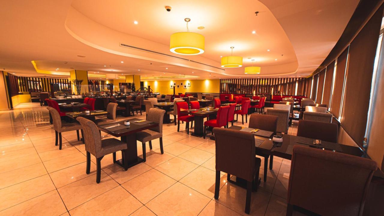 Oryx Hotel Aqaba Luaran gambar The interior of a typical buffet restaurant